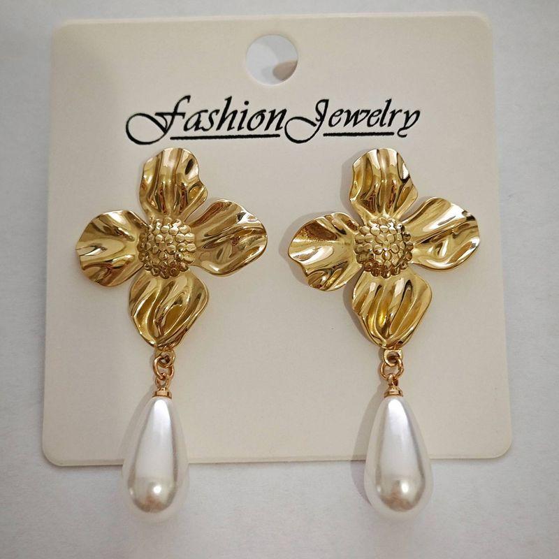 European and American Minimalist Style High-End Stainless Steel Earrings with Exaggerated Petal Geometric Shell Texture Titanium Steel Earrings