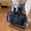 New multi-functional gym bag with separate compartments for wet and dry items, suitable for short trips, and featuring a large capacity and a stylish