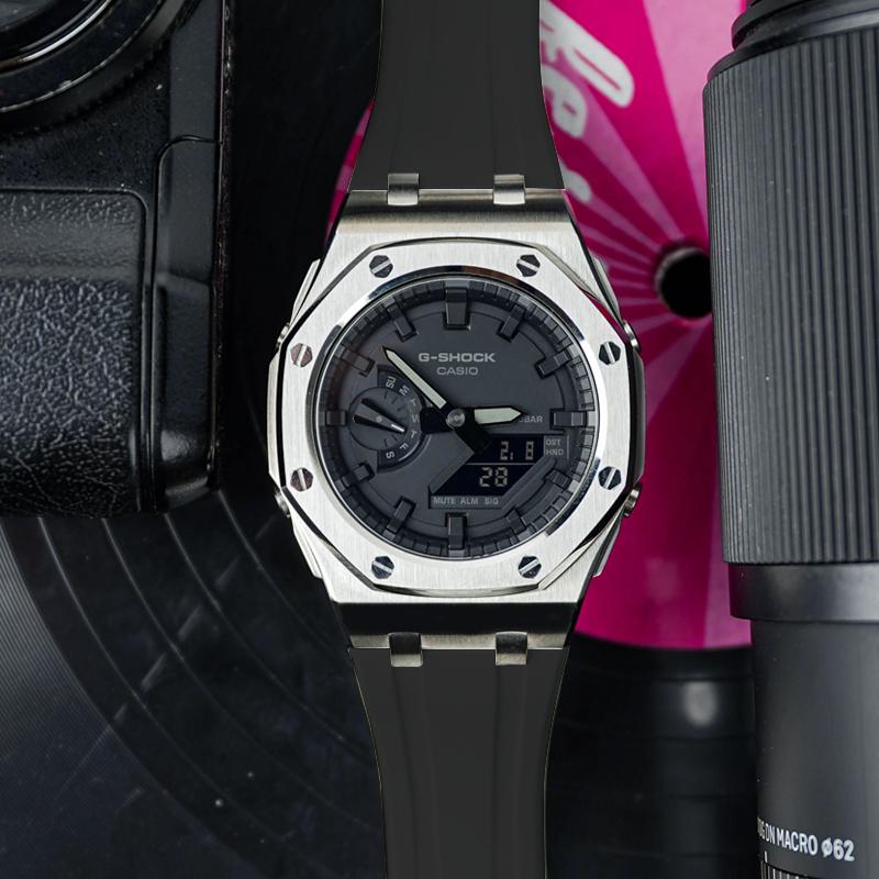 Casio Унисекс Жидкокристаллический, Аналогово-цифровой Двойной дисплей Серия Черные часы GA-2100-1A1(Часы1--)