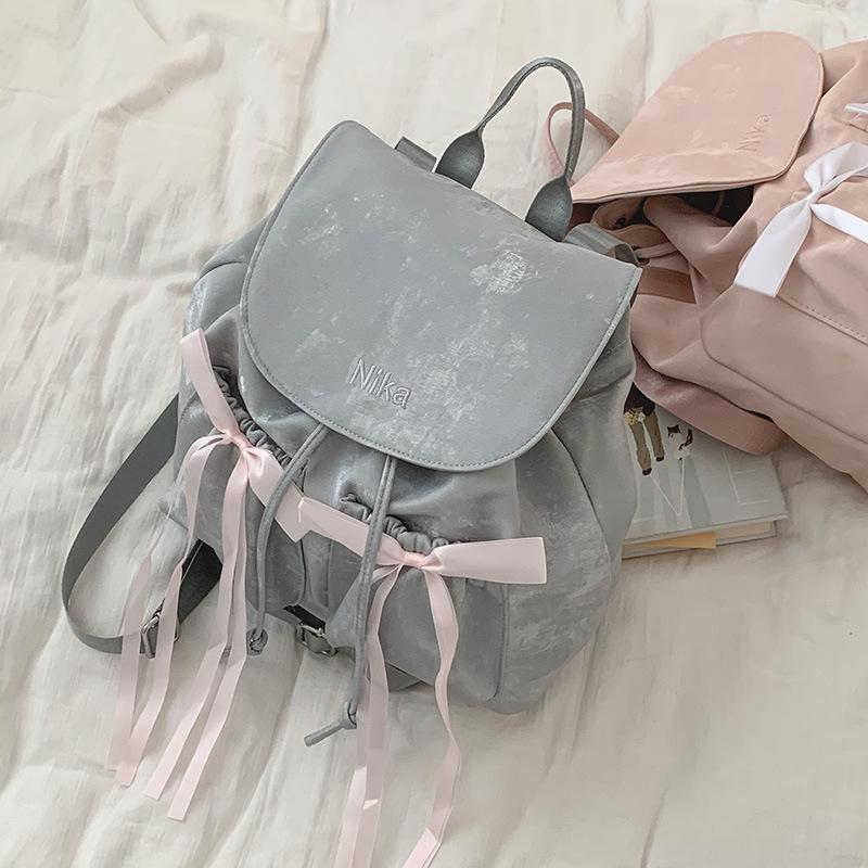 Повседневный рюкзак с бантом из нейлоновой парусины, женская сумка, новый нишевый рюкзак 2025, простая дорожная сумка