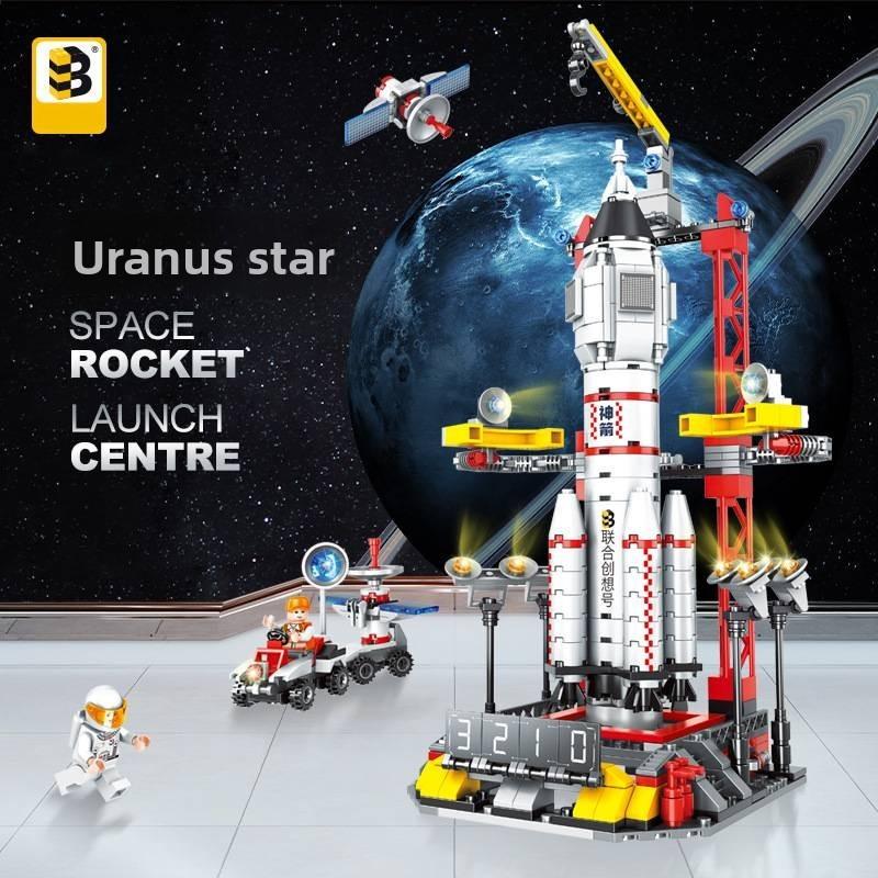 Собирает ракету Шэньчжоу из АБС-пластиковых строительных блоков для ежедневного подарка детям