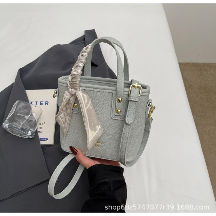 Fashion and High-quality Lychee Pattern Temperament Casual Portable Bucket Bag Women's Versatile Commuting Niche Solid Color PU Messenger Bag