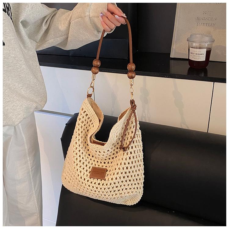 Праздничная плетеная сумка, женская летняя новая модная ажурная вязаная сумка через плечо, большая вместительная сумка для поездок на работу