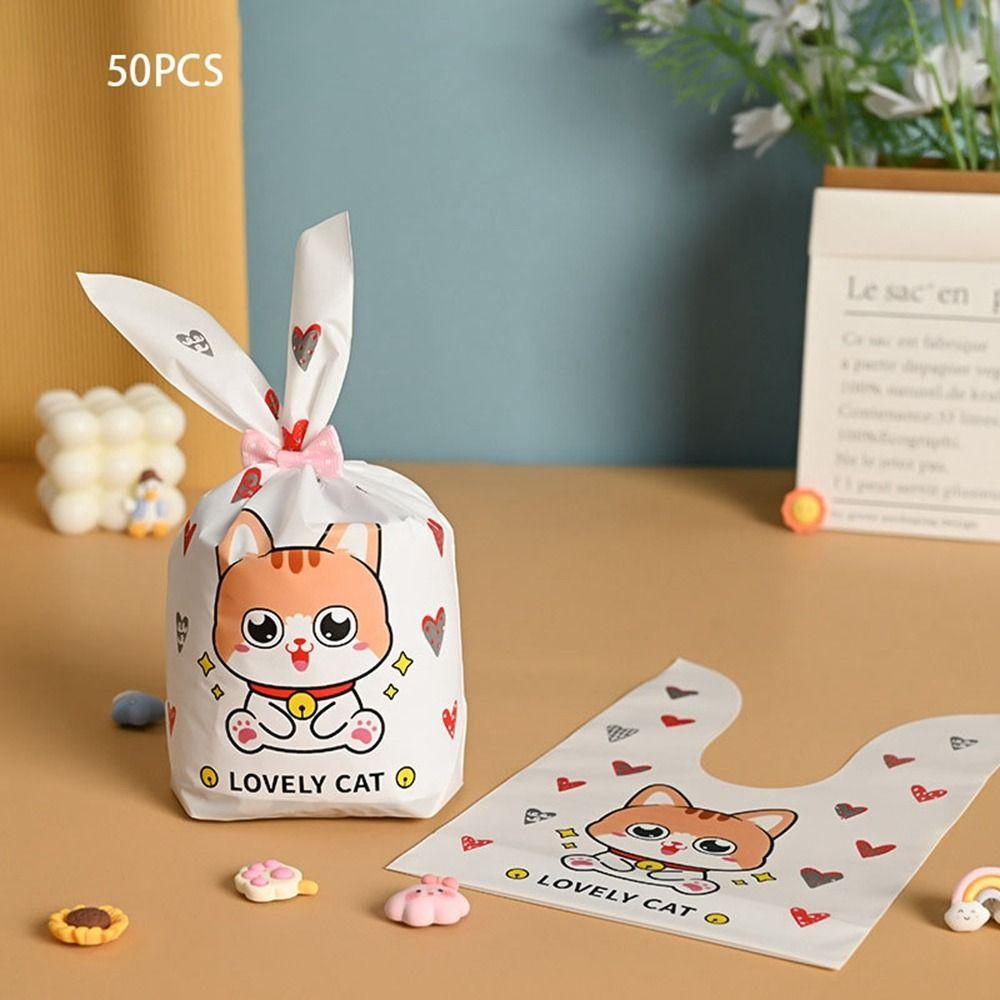 50 шт. Новые пасхальные картонные мешочки с ушками кролика, пластиковые мешочки для конфет в виде животных для детей, упаковка для печенья на день рождения, подарки своими руками