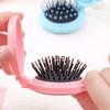 Folding Travel Comb Mirror Hair Brush Portable Mini Pocket Comb Compact Design On-the-Go Styling Mirror Comb for All Hair Types