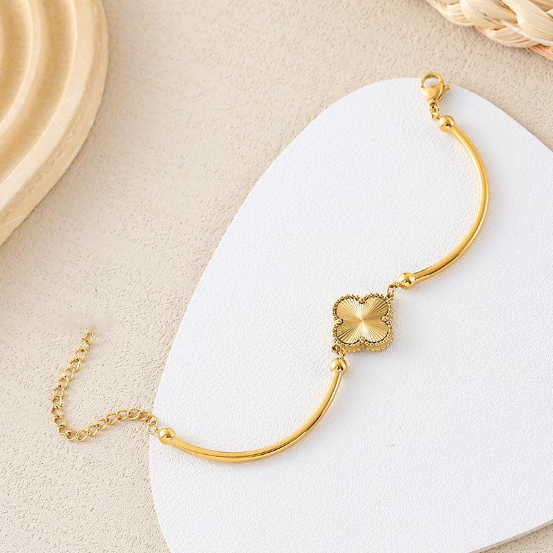Элегантный золотой женский браслет и колье в виде четырехлистного клевера