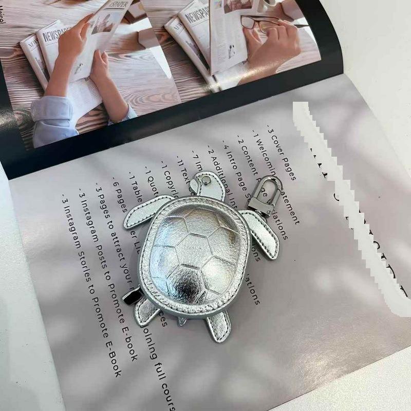 2025 Новый кожаный кулон Head Layer кожаный мини-кошелек для наушников Черепаха кулон Cross Border