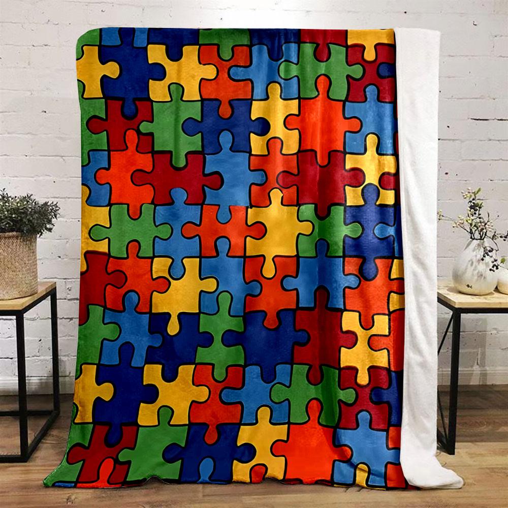 Interlocking colorful puzzle pieces in a random arrangement. for all seasons blanket lunch break throw gift