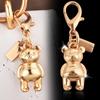 Gold Car Key Pendant: High-End Bear, Cherry, Four-Leaf Clover & Butterfly Handbag Accessory