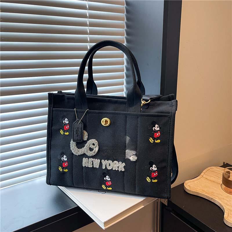 2025 Hot-Selling Large Capacity Canvas Tote: Stylish Commuter & Crossbody Bag.