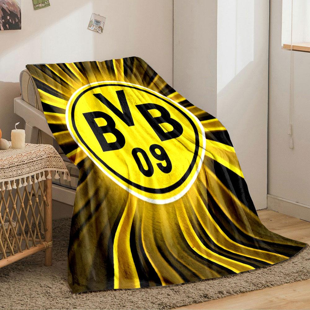 Yellow circular logo with "BVB 09" text, surrounded by radial light streaks. for all seasons blanket lunch break throw gift