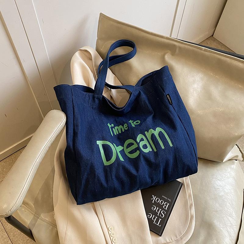 Модная и повседневная сумка-тоут большой вместимости женская 2025 новая сумка-мессенджер для通勤, корейская версия холщовой женской сумки с алфавитом