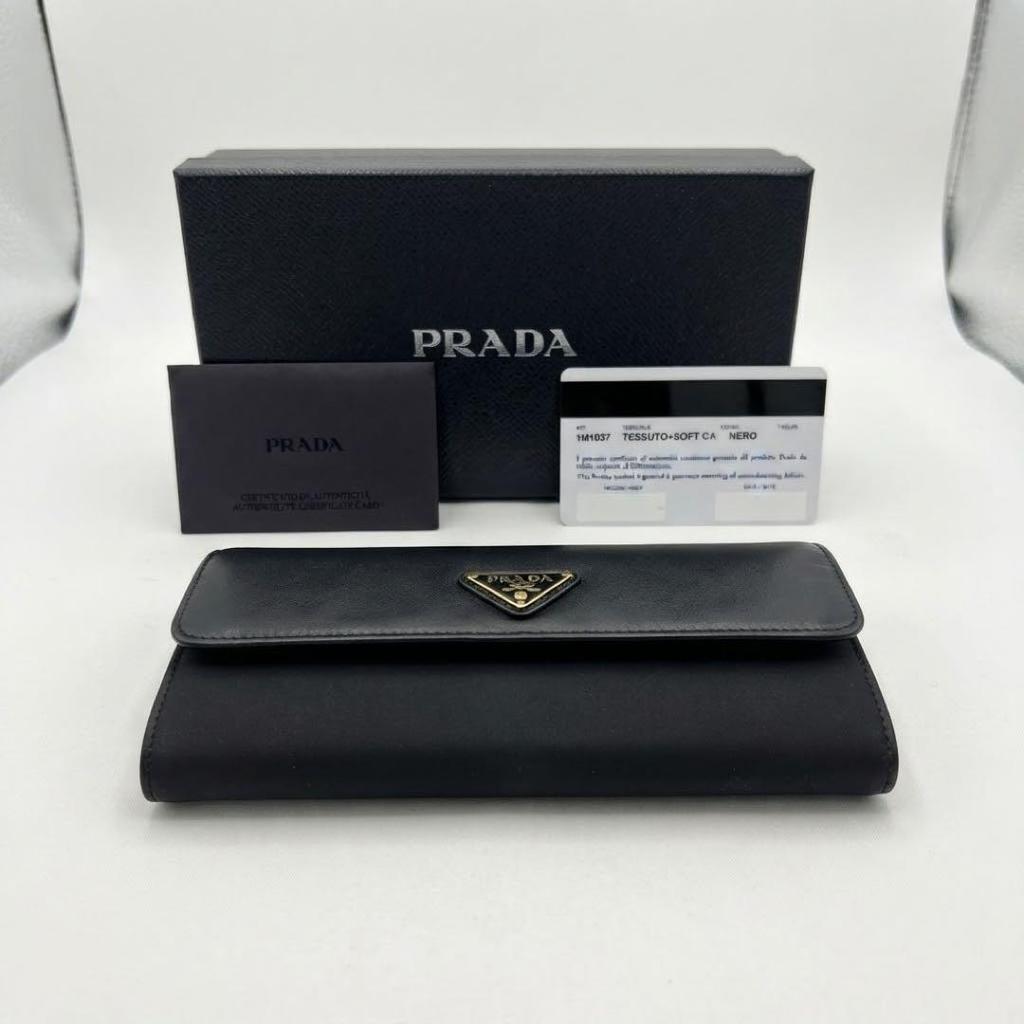 Used PRADA Bi-fold long wallet Black 1M1037 With guarantee card and box