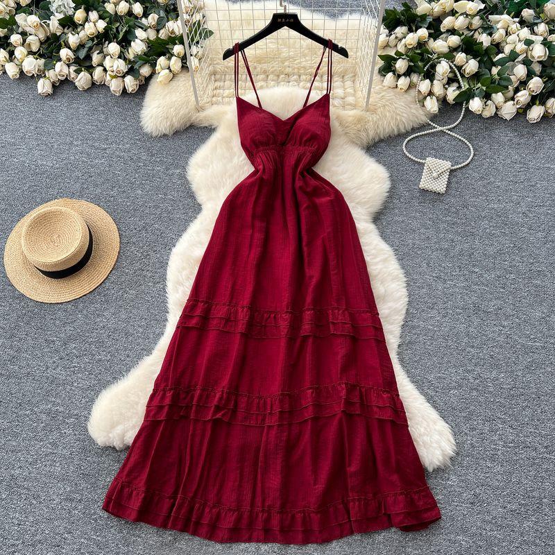 Red Holiday Style Dress Women 2025 Summer French Style Pure Desire Waist Hugging Temperament Sling Wooden Ear Backless Long Dress