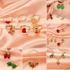 Trendy Personalized Christmas Earrings: Fashionable Creative Bell & Tree Set for Women