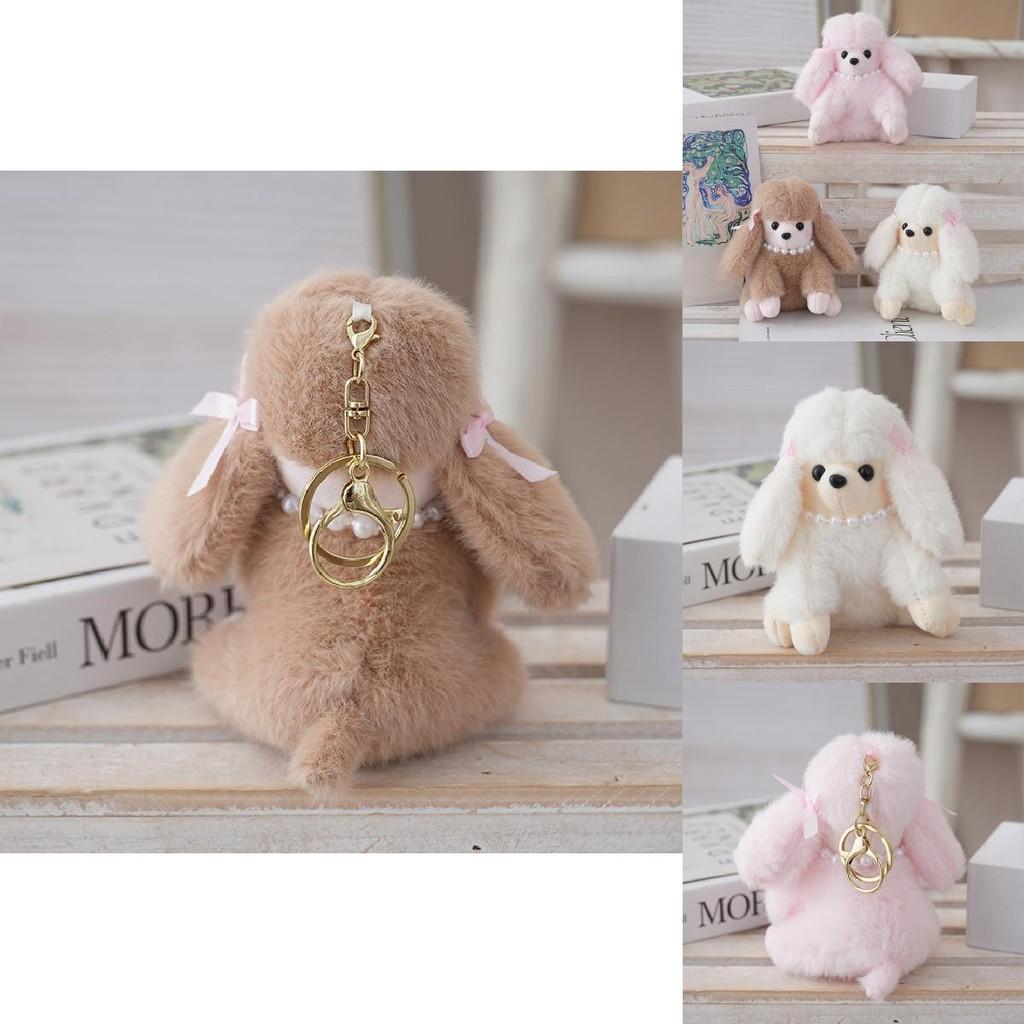 Милая плюшевая кукла-пудель в сидячем положении с пушистым бархатным мехом — идеальный подарок.