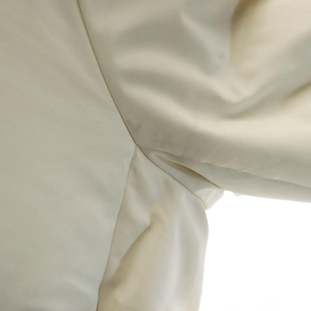 Uniqlo Бесшовная пуховая куртка M кремовая Женская Б/у