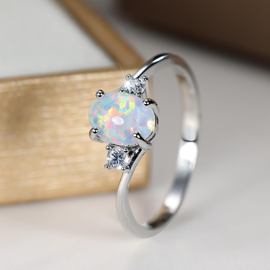 Shein explosion four-claw oval opal edge inlaid with white diamond zircon silver ring female, high-end simple and versatile