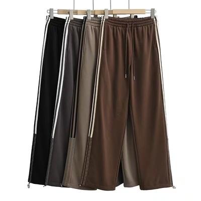 2025 Ранняя осень Женские свободные спортивные брюки контрастного цвета в стиле пэчворк, свободные повседневные брюки с эластичной резинкой по бокам