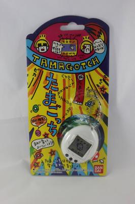 Первое поколение тамагочи BANDAI1996 (белый)