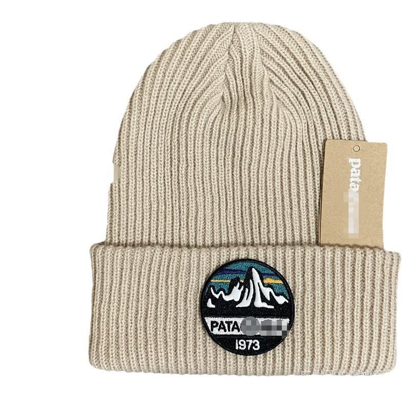 Street Style Knitted Beanie Cap With Embroidered Design For Urban Fashion