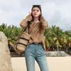 Женский текстурированный вязаный пуловер с вырезами
