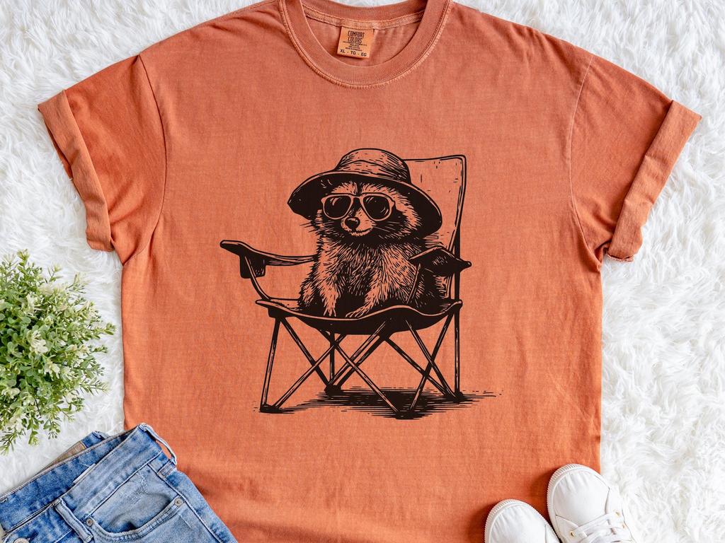 Vintage Raccoon Beach T-Shirt, Funny Relaxing Raccoon in Chair Tee, Retro Summer Animal Gift, Western Cowboy Wildlife Tee