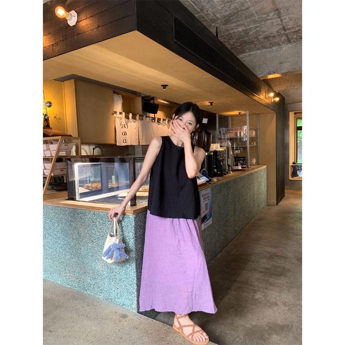 Summer new loose and versatile black sleeveless vest women's pleated A-shaped pendulum skirt two-piece set