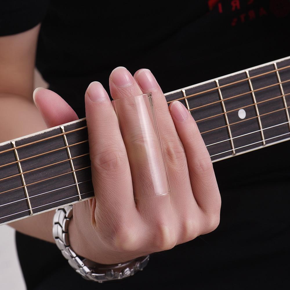 Набор гитарных слайдов включает 3 стеклянных слайда (5.1см  6см  7см) + 1 Горка из нержавеющей стали (6см) + 4 шт. целлулоидный напальчник и