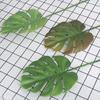 Искусственный лист Реалистичная форма Широко применяемый гибкий декоративный пластиковый поддельный лист монстеры