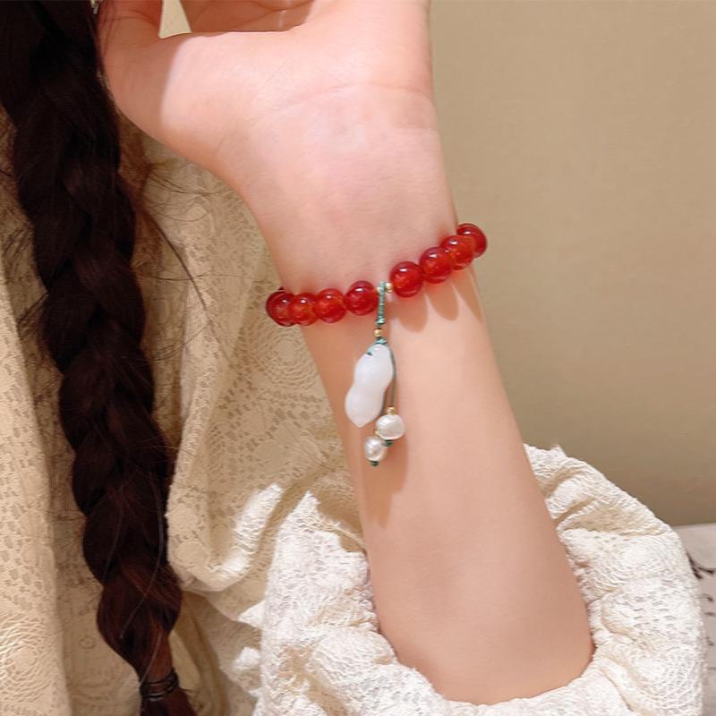 Браслет из натуральных камней красного цвета в китайском стиле - элегантное и универсальное женское украшение