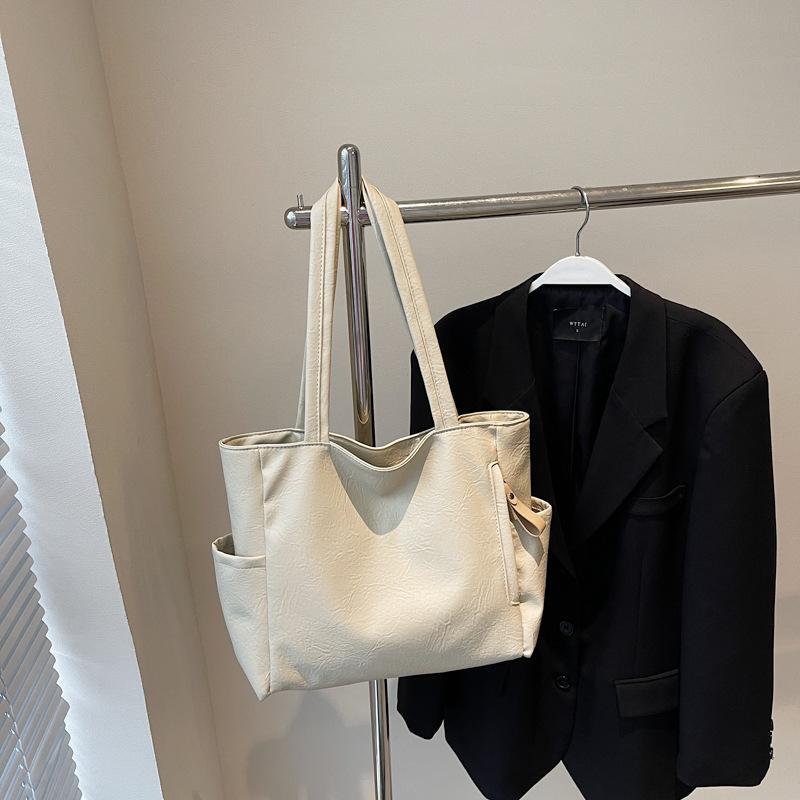 Сумка большой вместимости женская 2025 новый нишевый дизайн ретро повседневная модная сумка-тоут деловая поездка通勤 плечевая сумка