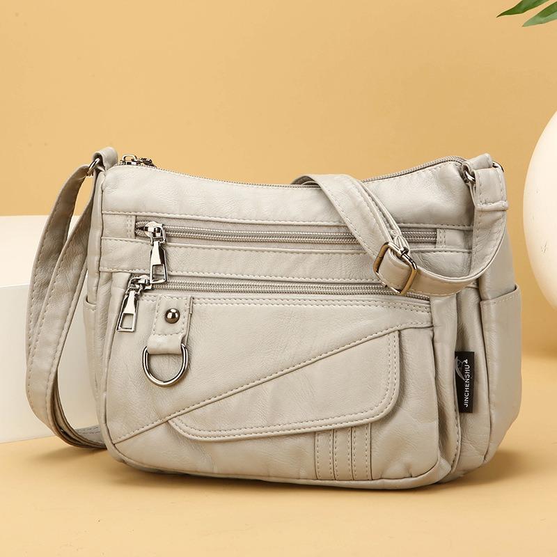 Вместительная одноплечевая легкая сумка-кроссбоди из мягкой кожи