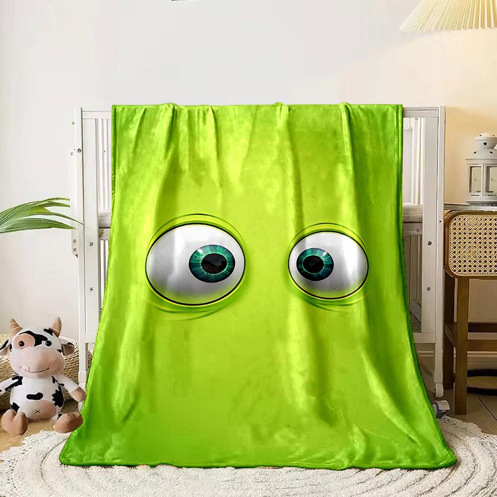 Two large, cartoonish eyes on a bright green background. for all seasons blanket lunch break throw gift
