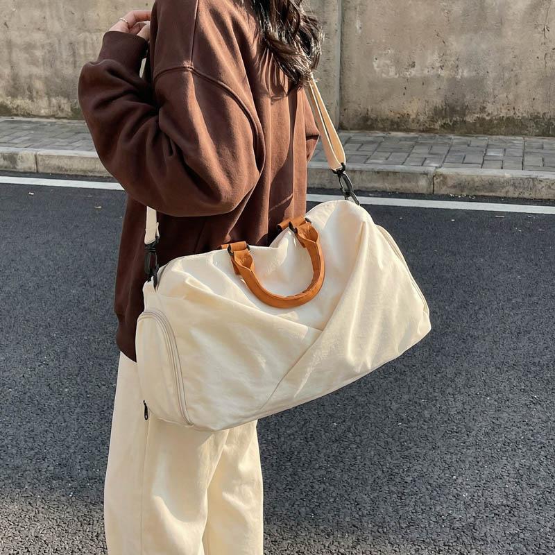 New travel bag, large capacity, with separate compartments for wet and dry items, suitable for gym, swimming, and as a shoulder or crossbody bag
