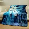 Silhouettes of seals swimming toward light underwater with a glowing effect. for all seasons blanket lunch break throw gift