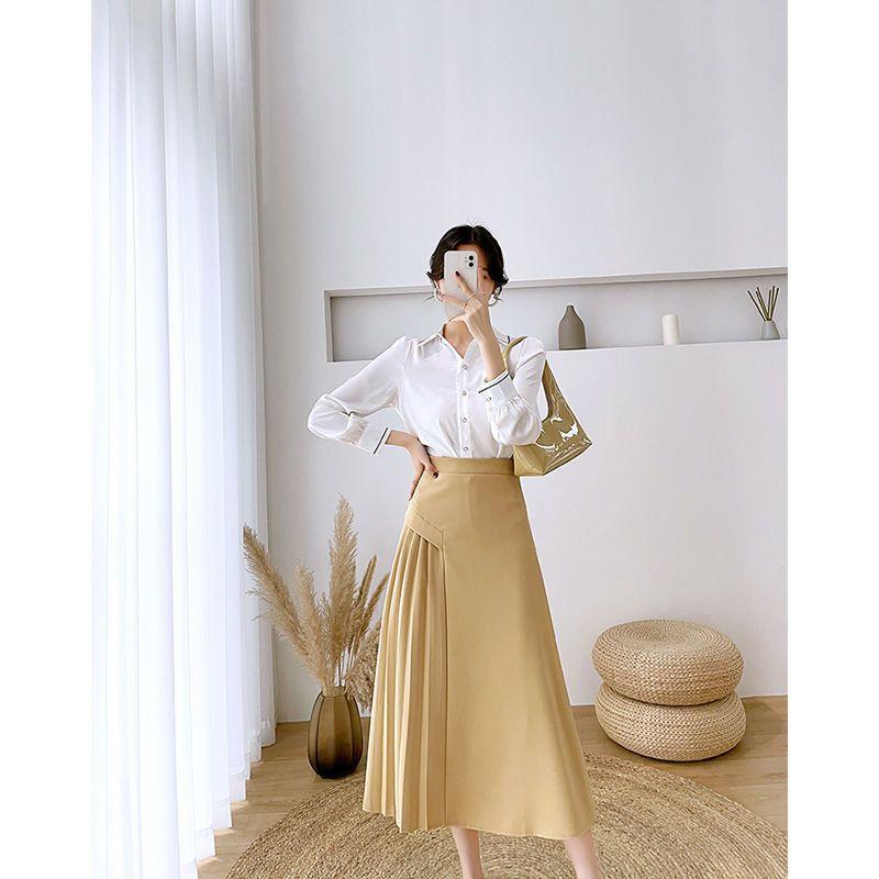 Простая нерегулярная однотонная драпированная плиссированная юбка, женская весенняя темпераментная пригородная юбка трапециевидной формы с высокой талией средней длины