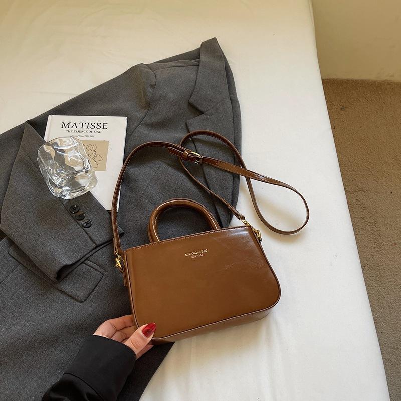 Премиальная текстура портативная сумка-ведро женская 2025 новая модная осенне-зимняя мода универсальная ретро деловая сумка на плечо через плечо