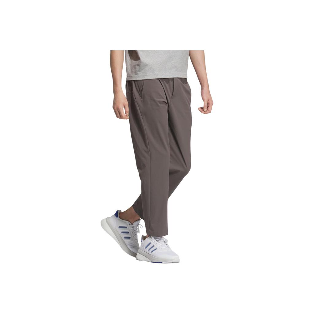 Adidas SS25 Motion Tracksuit Bottoms Fashion Versatile Solid Color Tapered Sports Casual Pants Men Bottoms KE6007