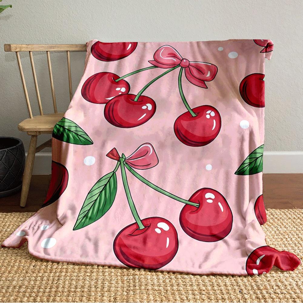 Red cherries with green stems and leaves, pink bows, on soft pink background. for all seasons blanket lunch break throw gift