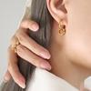 Серьги из титановой стали с золотым покрытием с подвесками-кольцами с зелеными цирконами