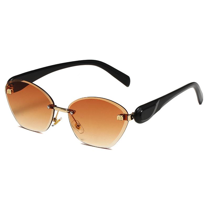 New cat eye sunglasses women's European and American fashion diamond trimmed rimless sunglasses sunglasses