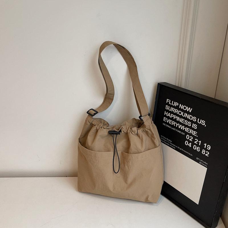 Новая летняя сумка-ведро большой вместимости с завязками на шнурке для женщин, японская повседневная сумка через плечо, уличная сумка для поездок на работу и обратно