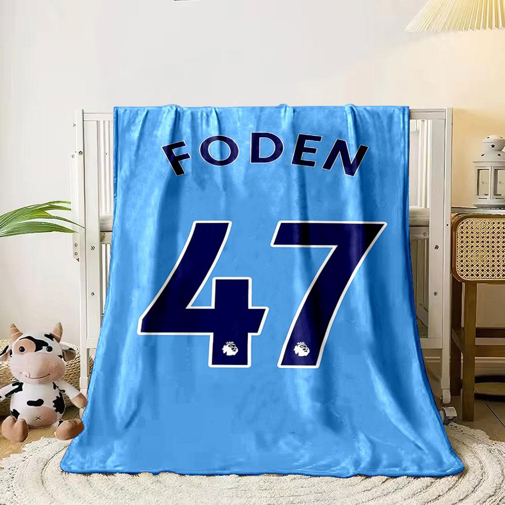 Blue background with "FODEN" and large navy "47" outlined in white. for all seasons blanket lunch break throw gift