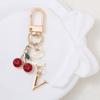 1 шт. Изысканный металлический брелок с 26 английскими буквами, Милый брелок с алфавитом, Современная простота, Подвеска-бабочка, Подвеска-вишня