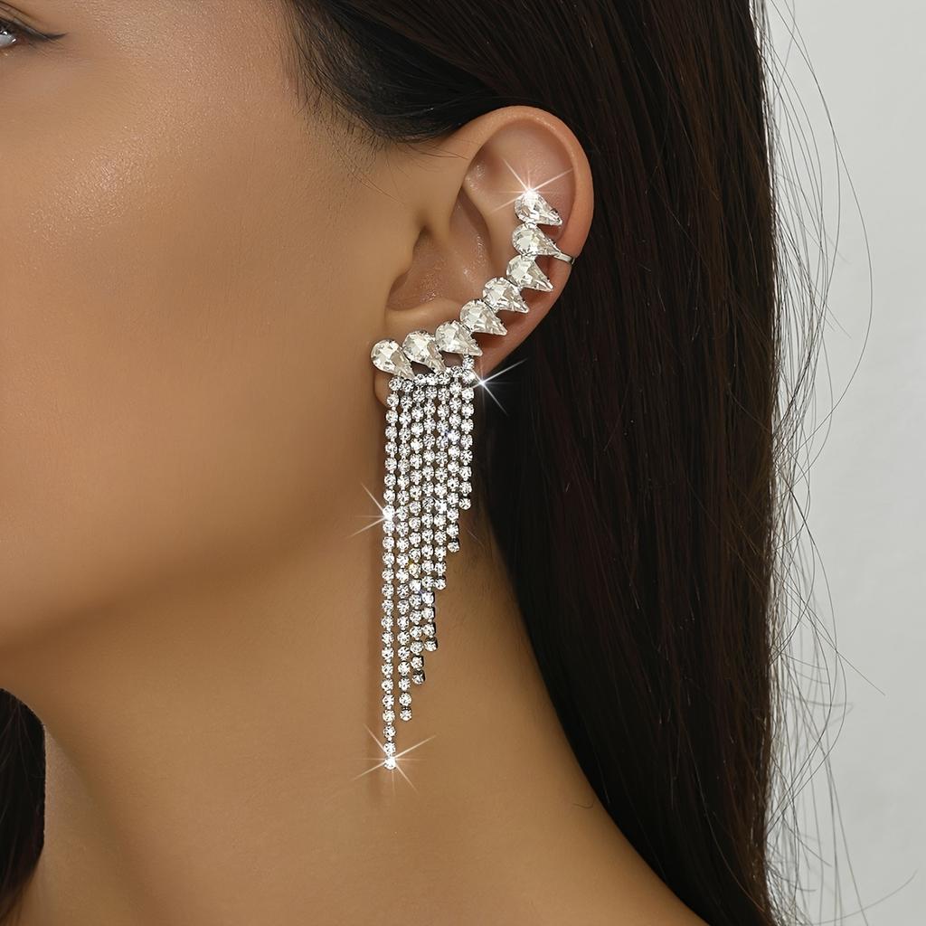 Tassel design with rhinestone embellishments, sparkling wing ear clips, elegant and luxurious party earrings for women