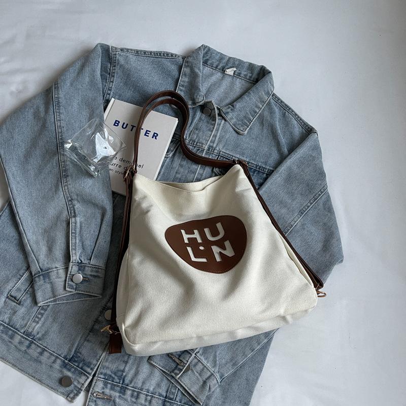 Холщовая сумка женская 2025 новая модная большой вместимости многоцелевой рюкзак студенческий класс на плечо сумка-тоут