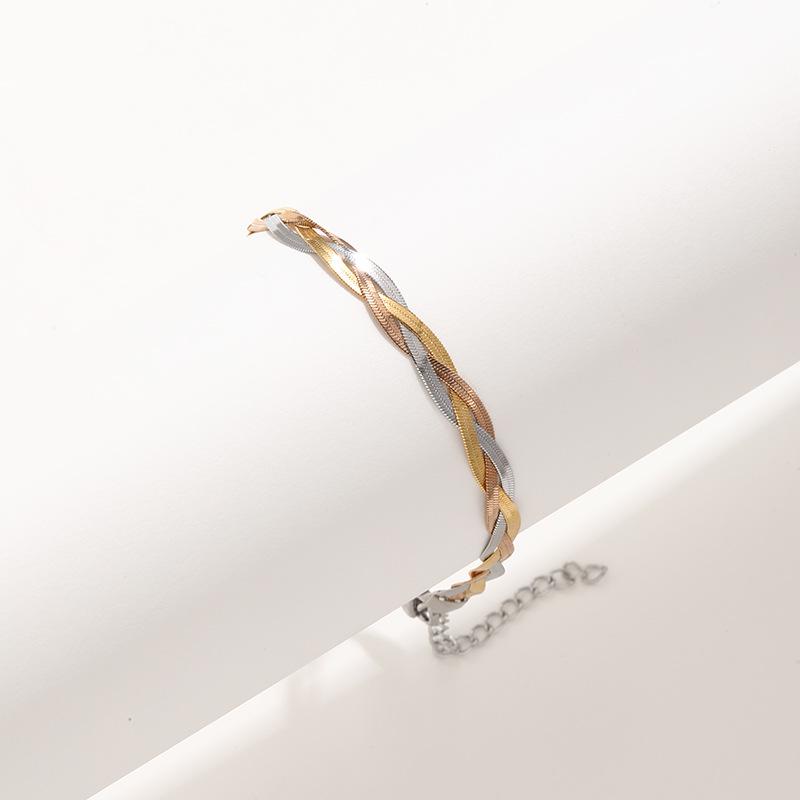 Браслет из розового золота с обмоткой и лезвием из нержавеющей стали