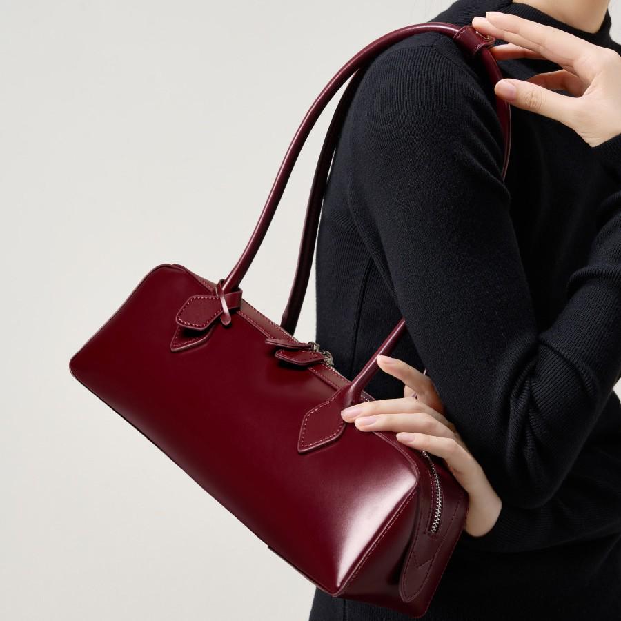 2025 Нишевая сумка из коровьей кожи: Универсальная, вместительная сумка подмышку и для поездок на работу для женщин