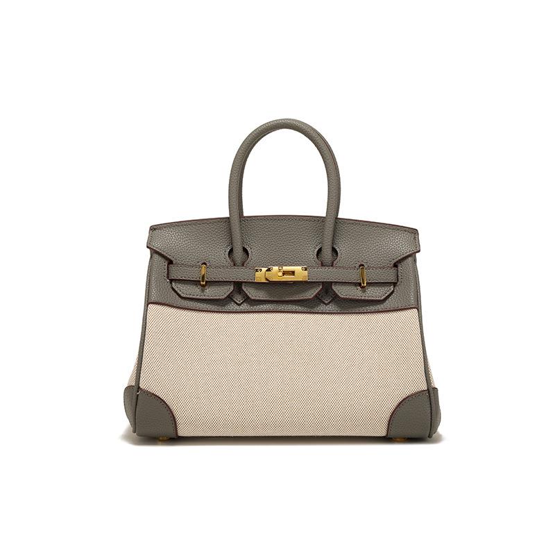 Весна 2025 г. Женская сумка через плечо из кожи и холста контрастного цвета